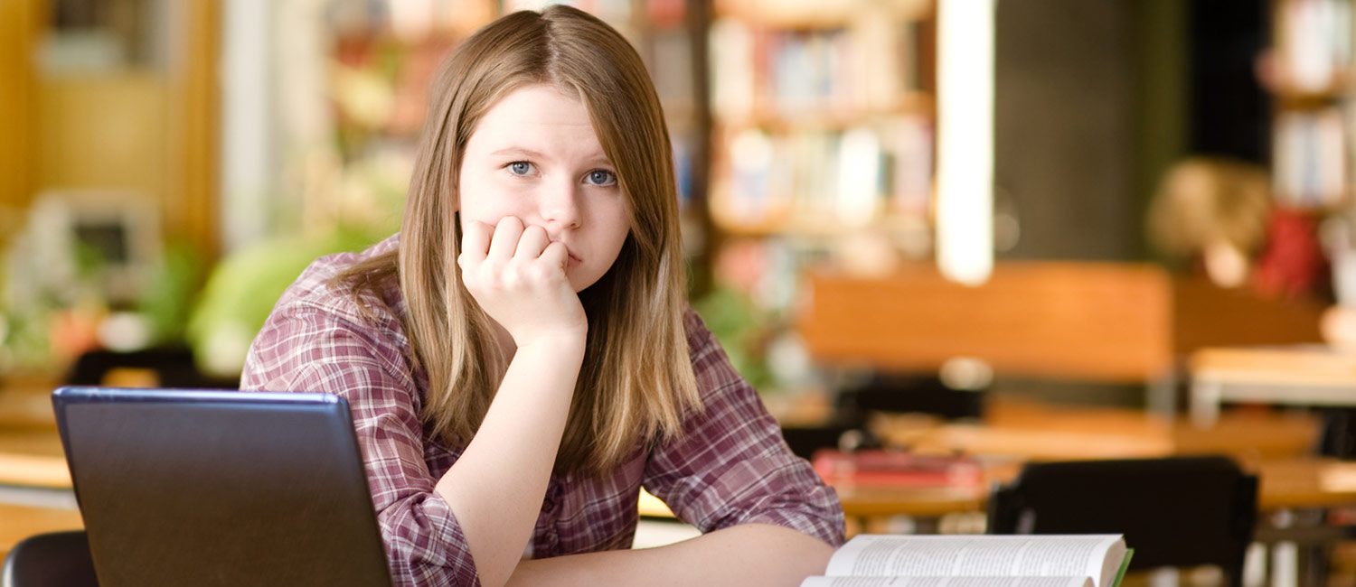  Girl demonstrating signs of being bullied 